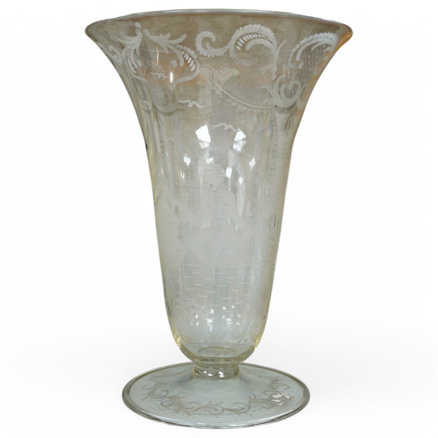 A Venetian engraved glass vase, decorated with views of Venice and a courting gentleman and lady, 31cm high. Condition - good